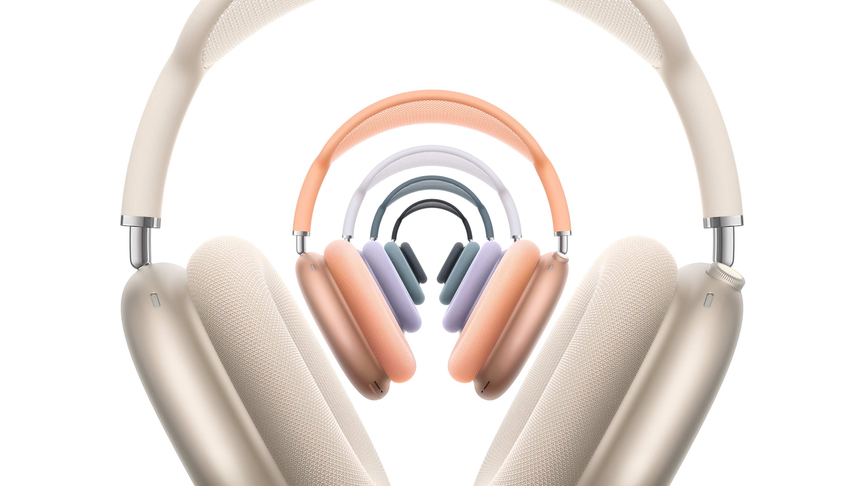 Five pairs of AirPods Max 2 headphones in Starlight, orange, purple, blue, and midnight